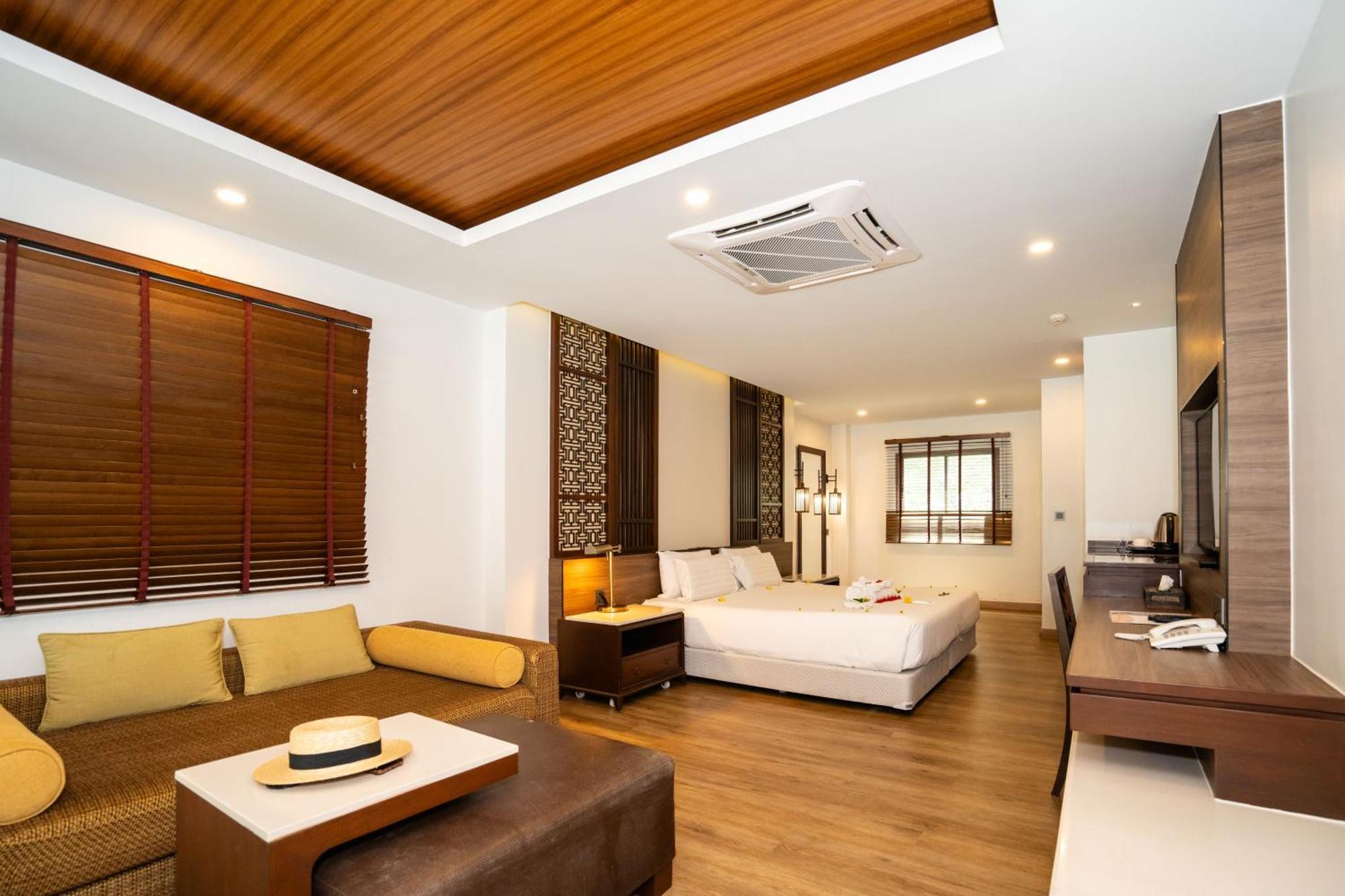 Le Resort And Villas Rawai Kültér fotó Deluxe Suite